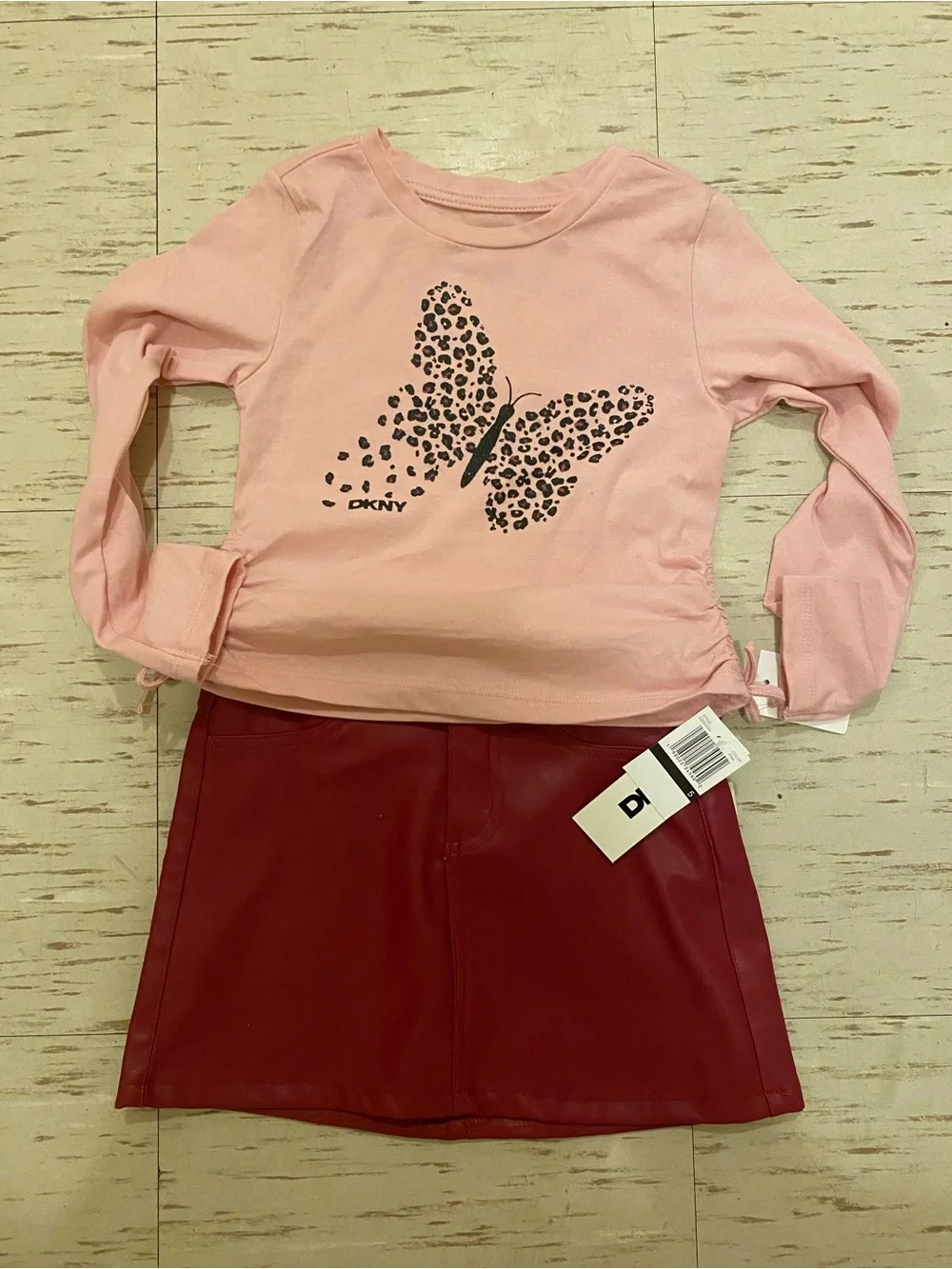 DKNY Pink Long-Sleeve Tee with Leopard Butterfly Print and leather skirt